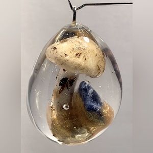 White mushroom with sodalite and gold mica powder